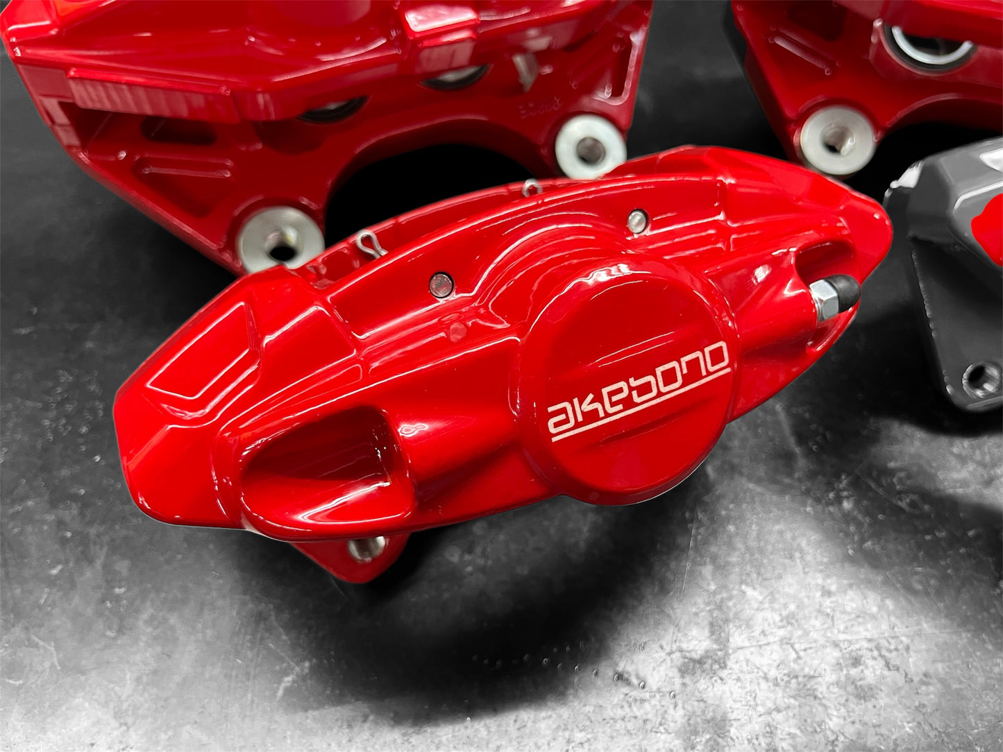 Custom Red NISSAN INFINITY w/ Akebono Logo Brake Calipers Set