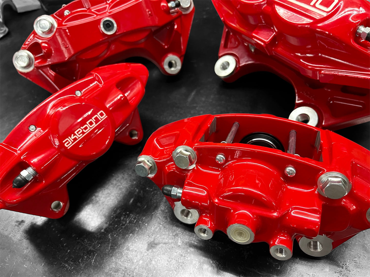 Custom Red NISSAN INFINITY w/ Akebono Logo Brake Calipers Set